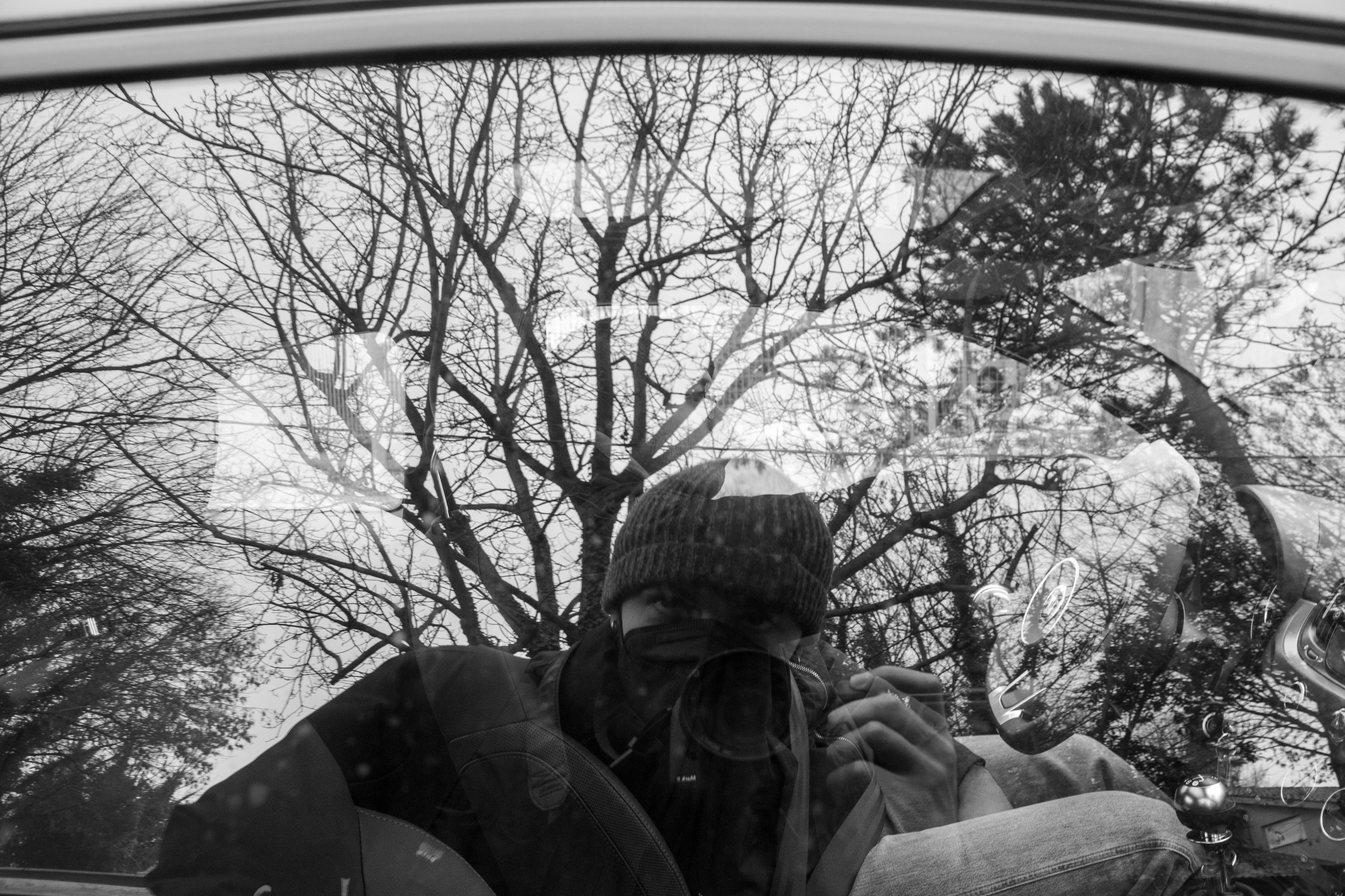 A man taking a picture of himself in a rear view mirror photo – Free ...