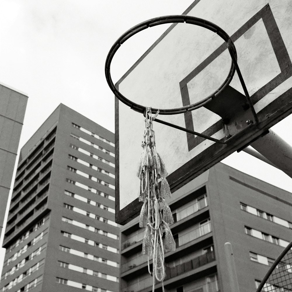 a black and white photo of a basketball hoop