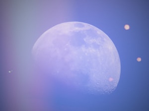 A serene image of a glowing crystal surrounded by soft moonlight.