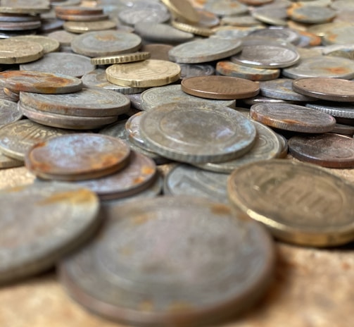 a pile of coins sitting on top of a table