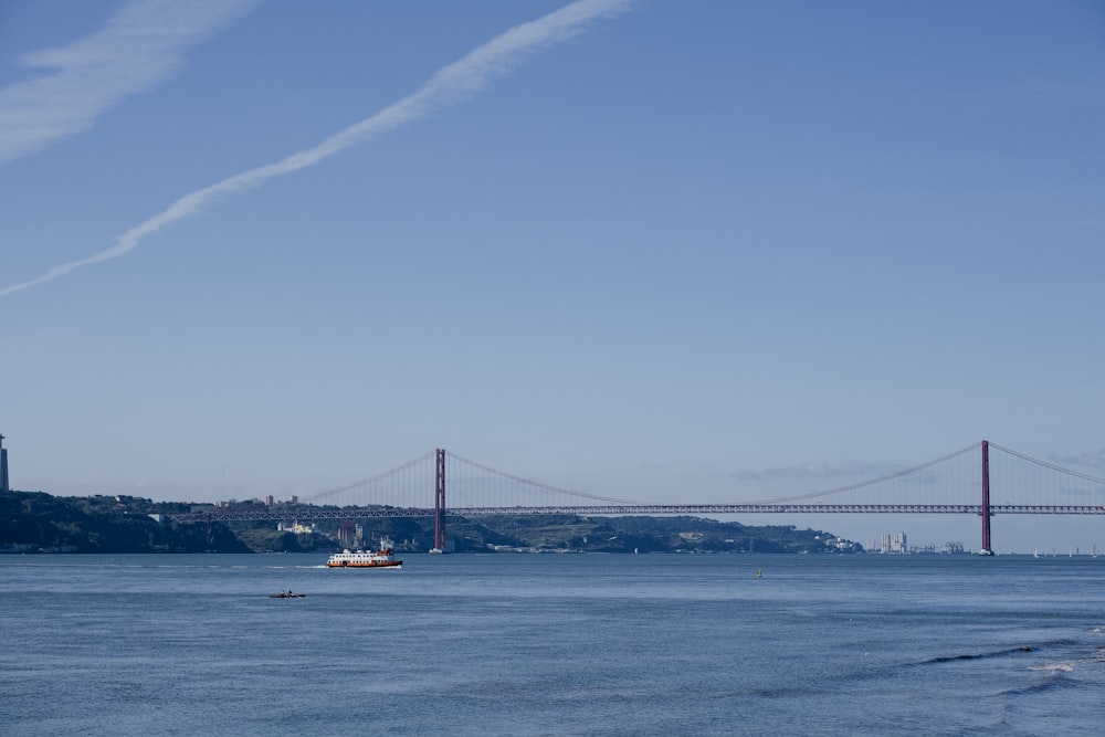 a large bridge spanning over a large body of water