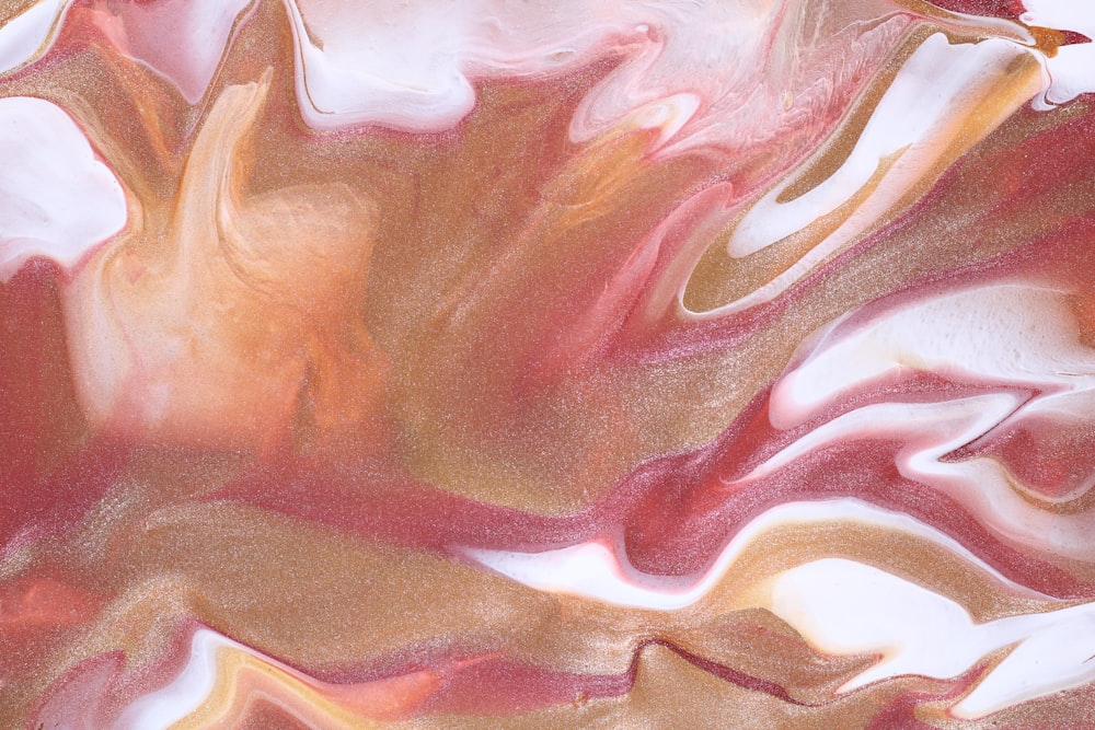 a close up view of a red and white swirl