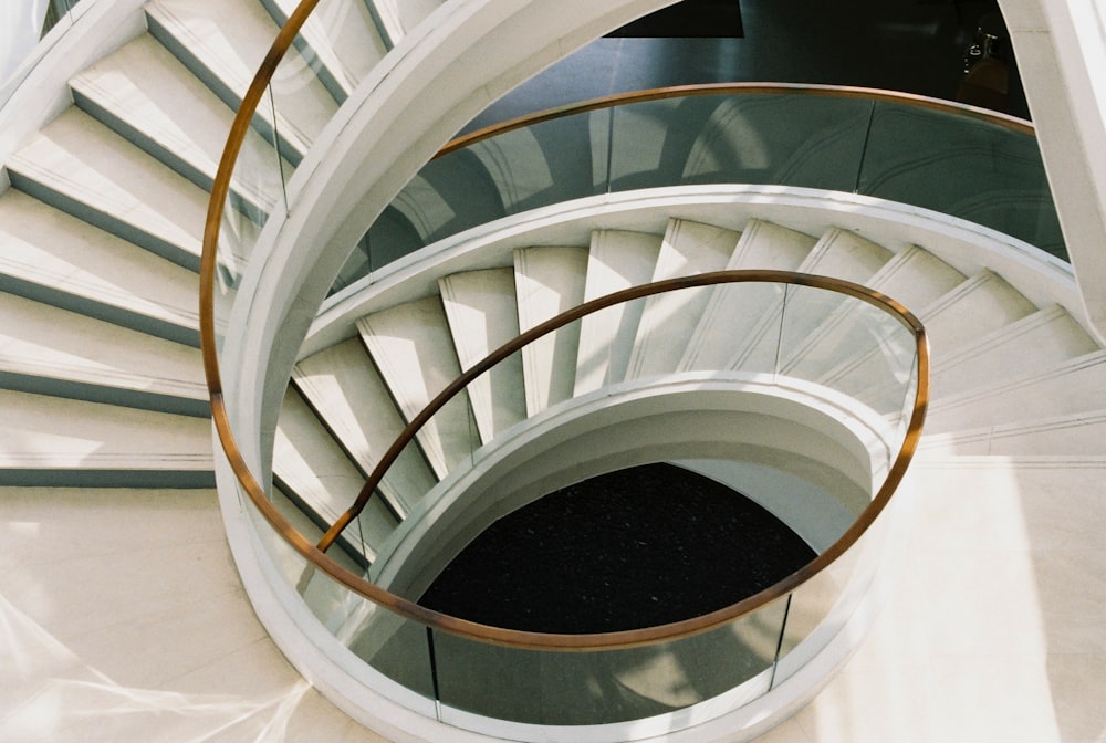 a close up of a spiral staircase in a building