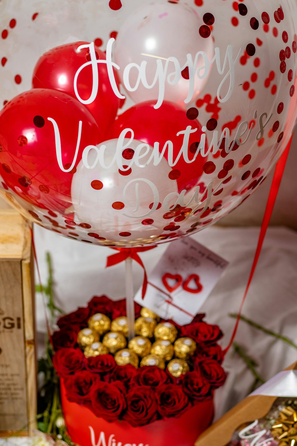 a bunch of balloons that are sitting on a table