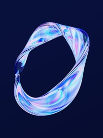 Abstract particle loop animation representing the brand’s continuous creative cycle in dark mode.