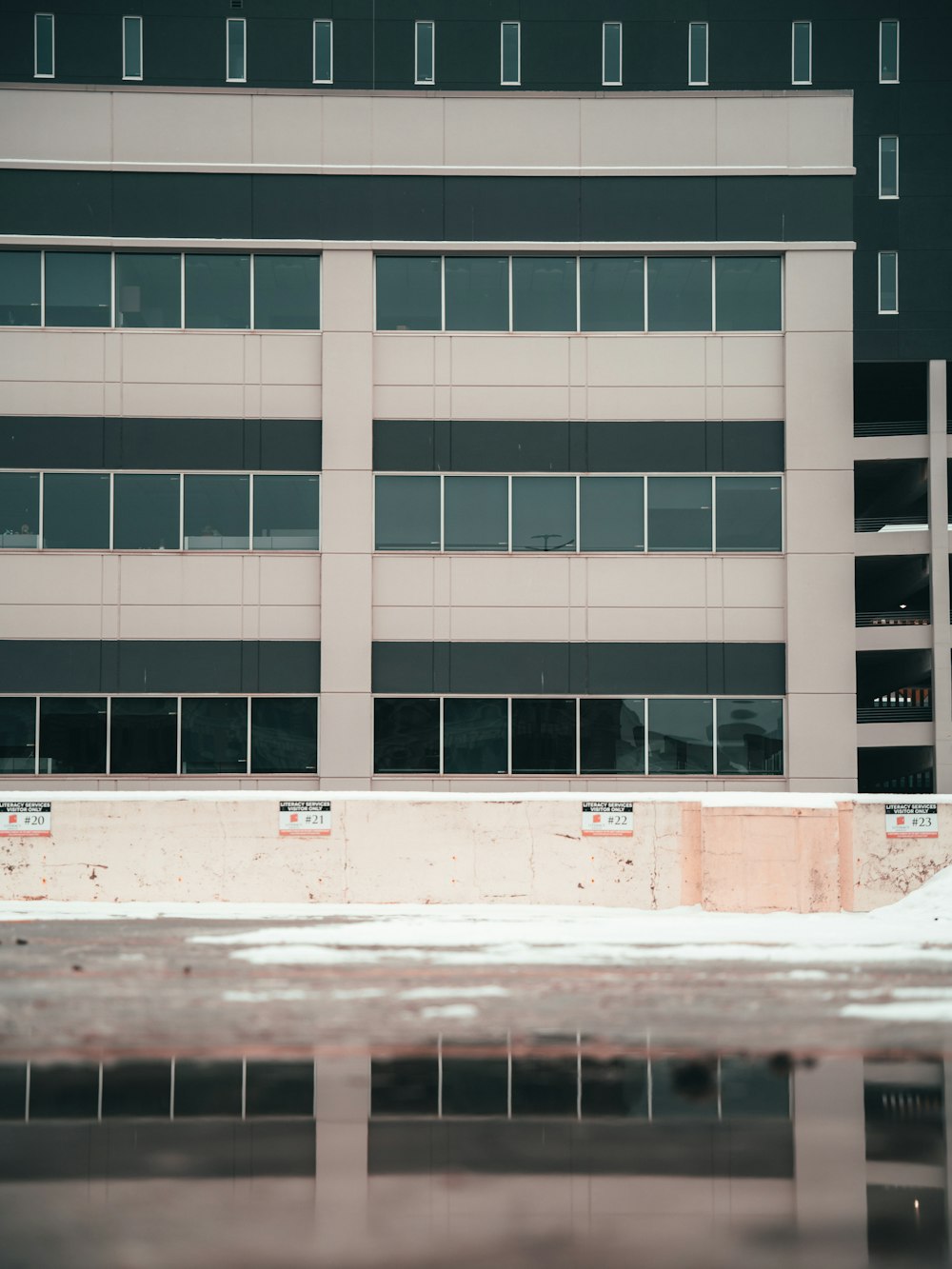 a skateboarder is doing a trick in front of a building