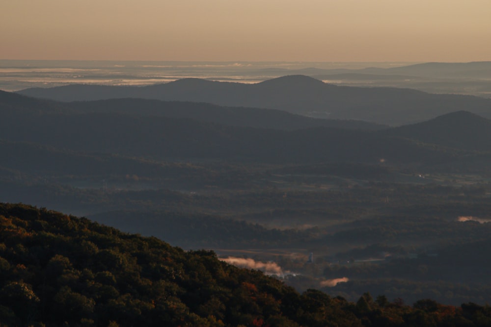 a view of a mountain range at sunset