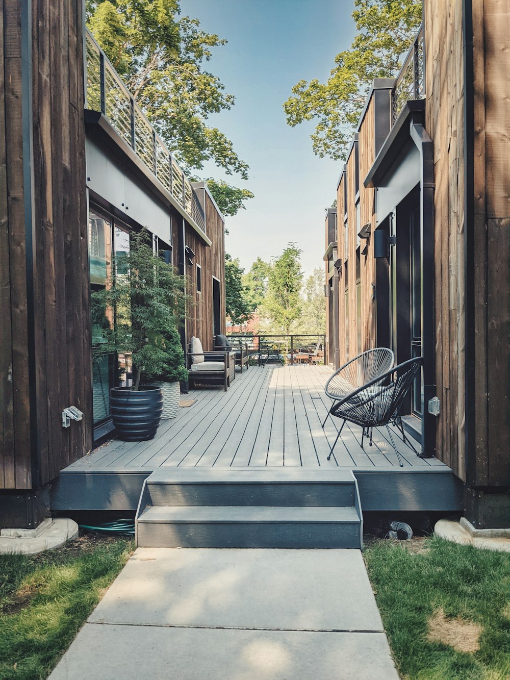 a wooden deck with a chair on it