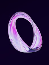 a purple swirl on a black background