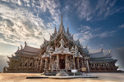 A beautifully crafted wooden temple with intricate details.