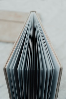 an open book sitting on top of a table