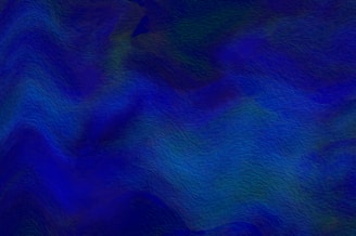 a blue and green background with wavy lines