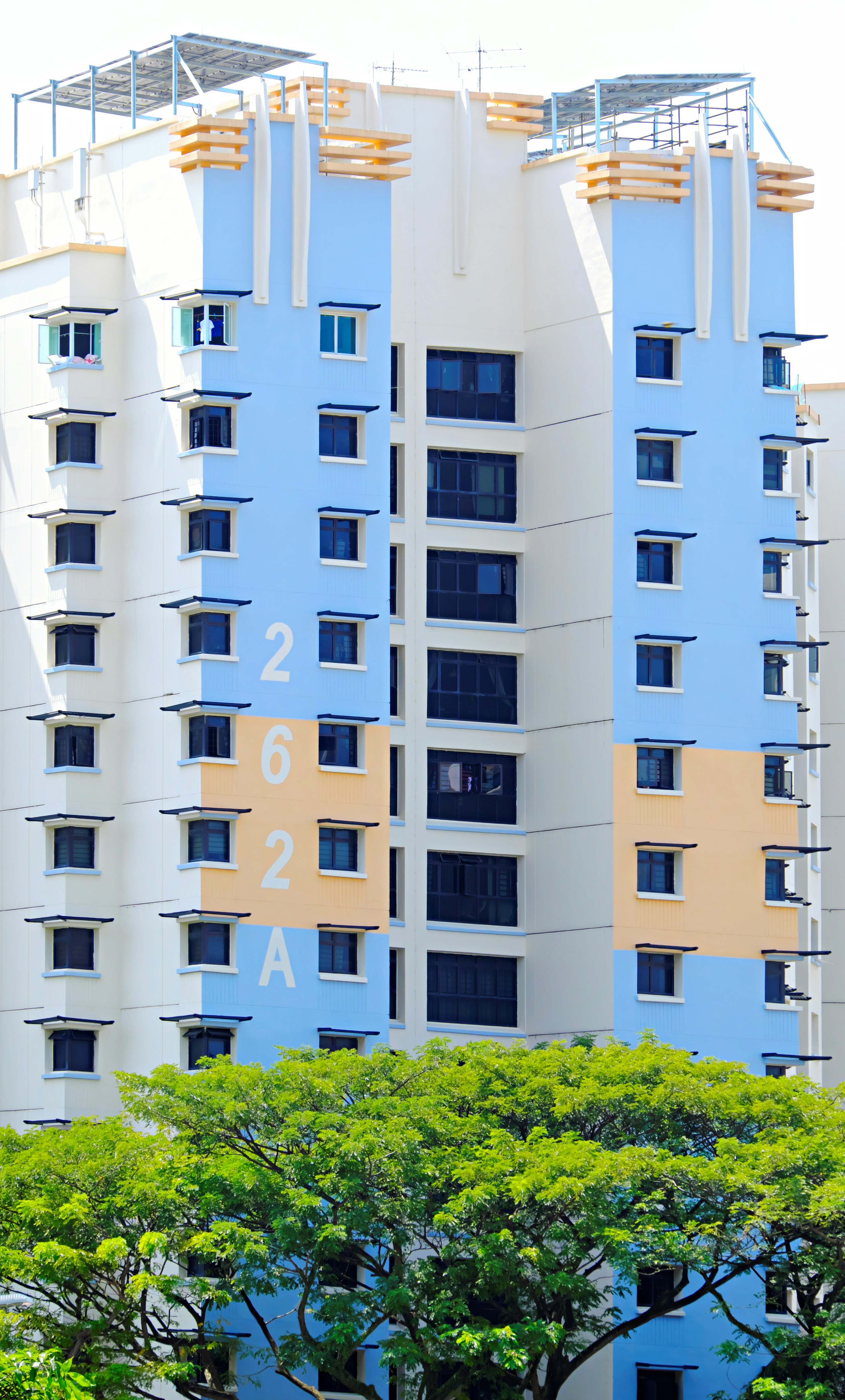 a tall building with a clock on the side of it