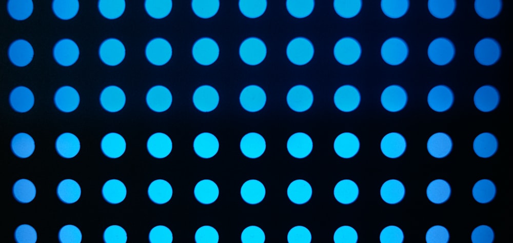 a black background with blue circles on it