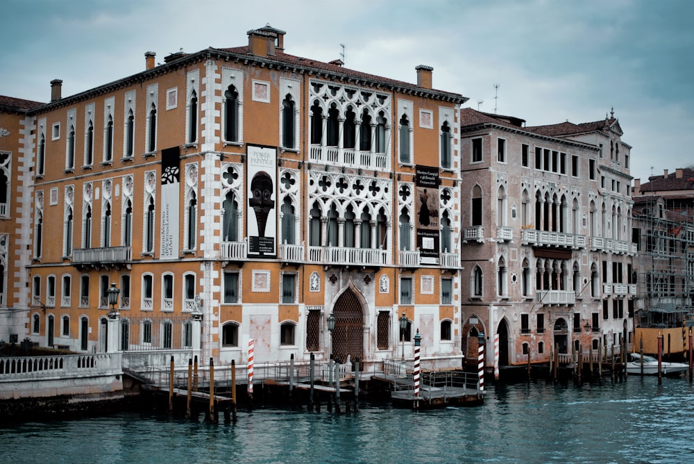 a large building sitting next to a body of water