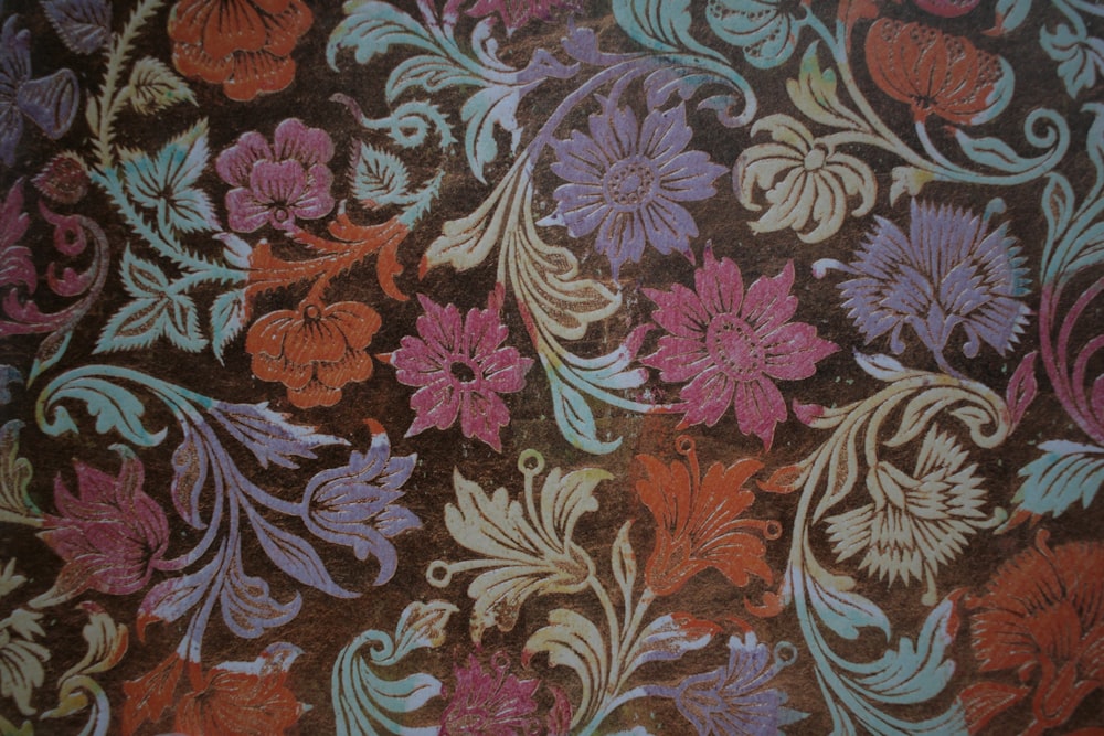 a close up of a flower pattern on a cloth