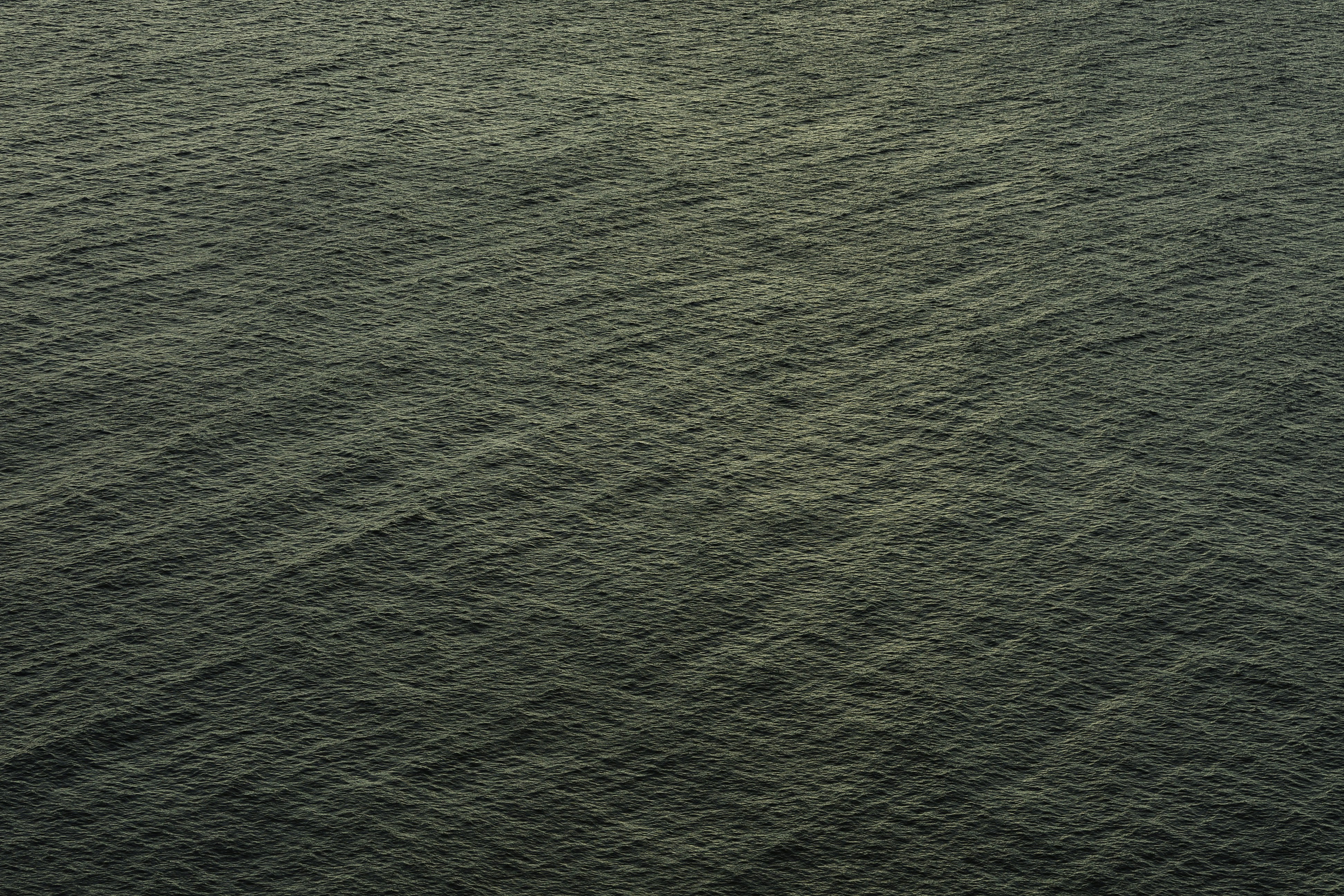 a large body of water with waves in it