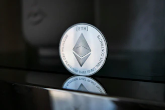 a close up of a coin on a table