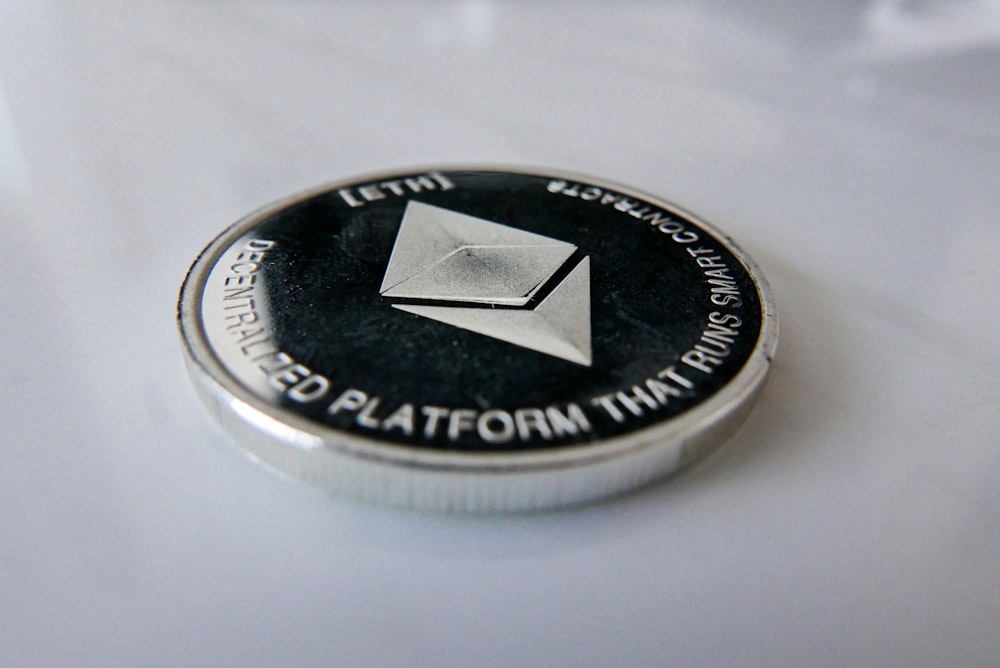 a close up of a coin on a table