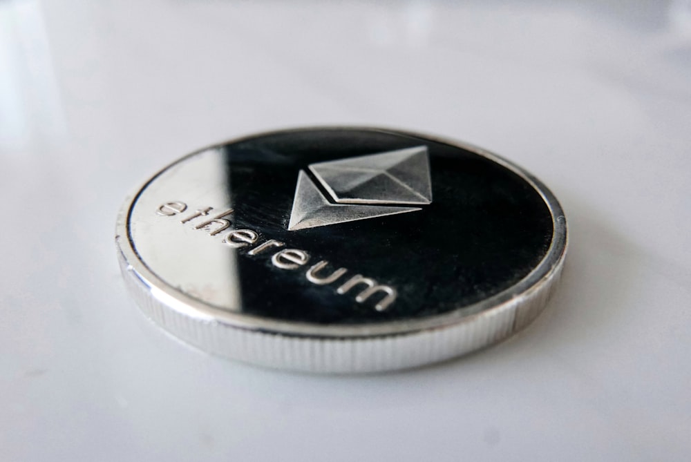 a close up of a coin on a table