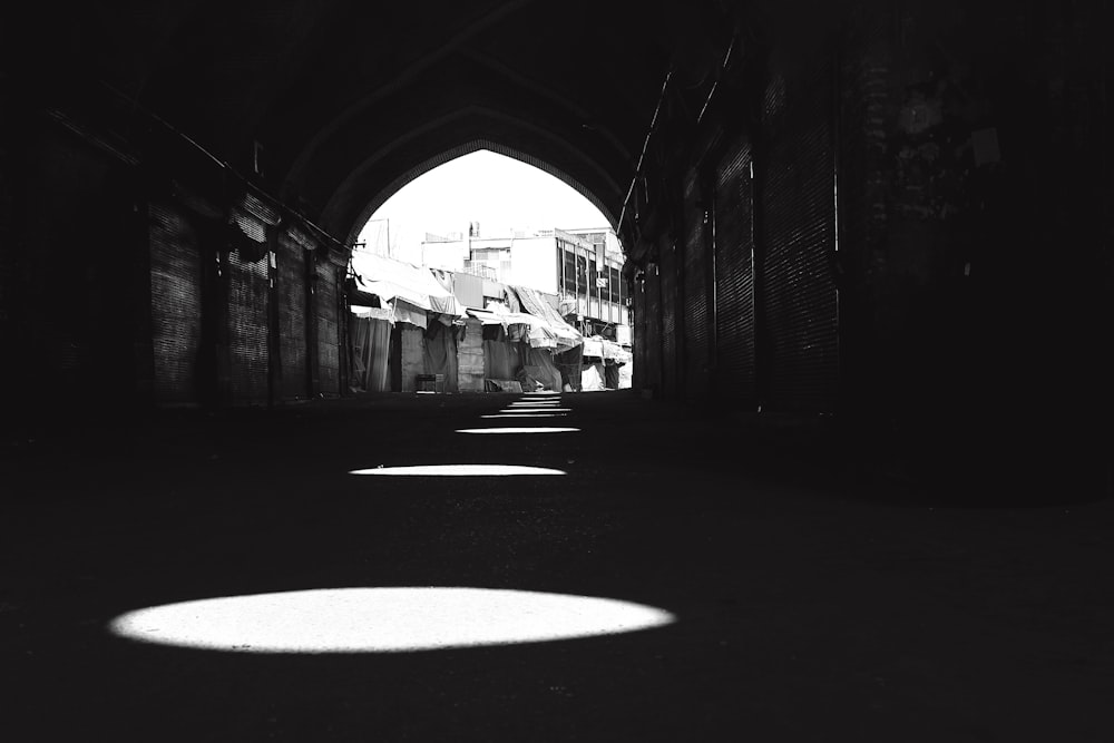 a black and white photo of a tunnel