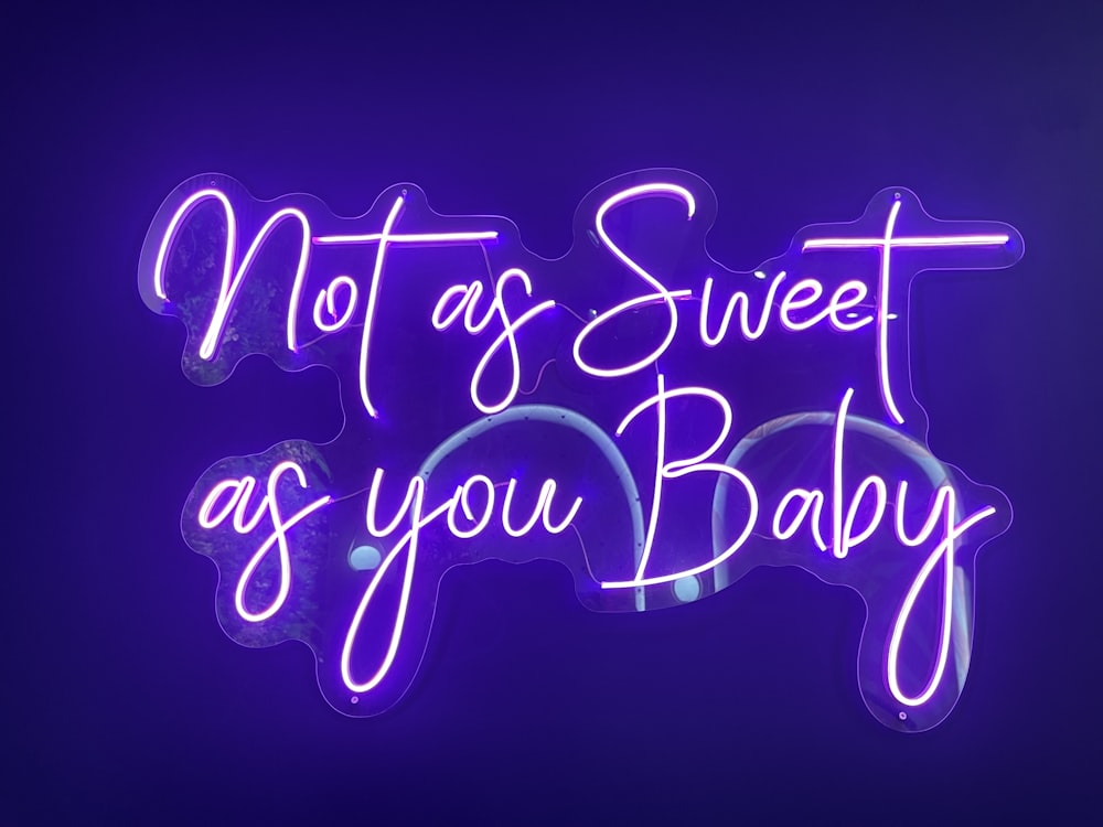 a neon sign that says, not as sweet as you baby