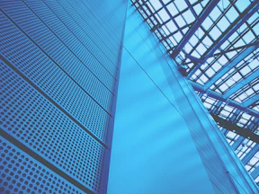 a tall building with a sky background