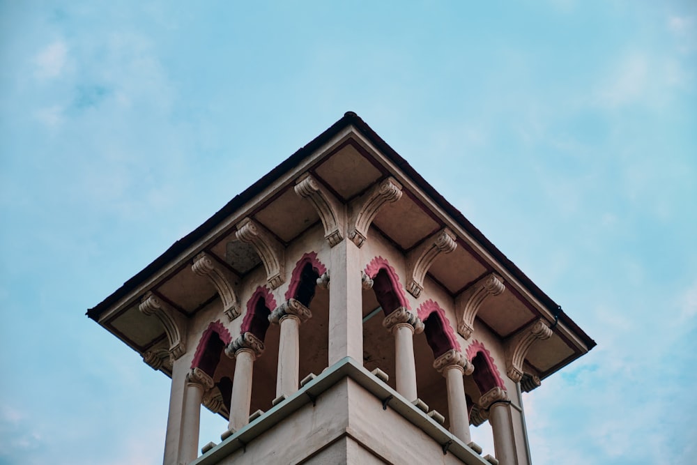 a tall clock tower with a sky background