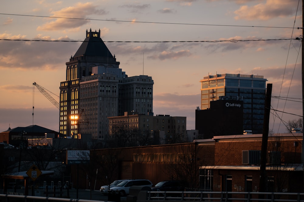 a view of a city at sunset from a distance