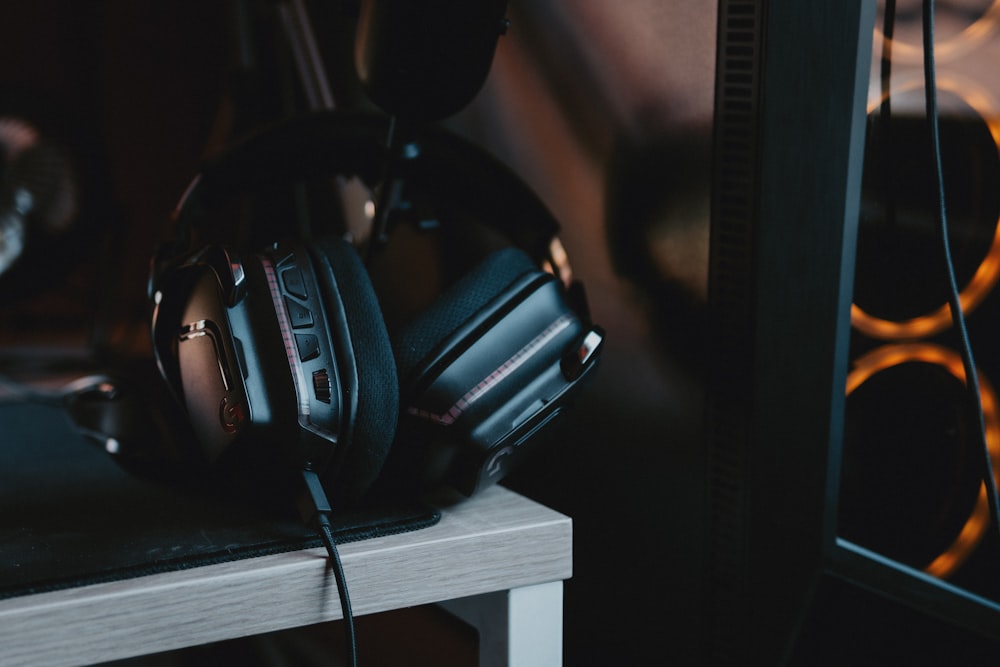 a pair of headphones sitting on top of a table