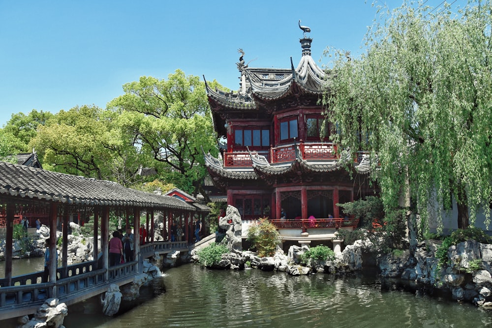 a building with a pond in front of it