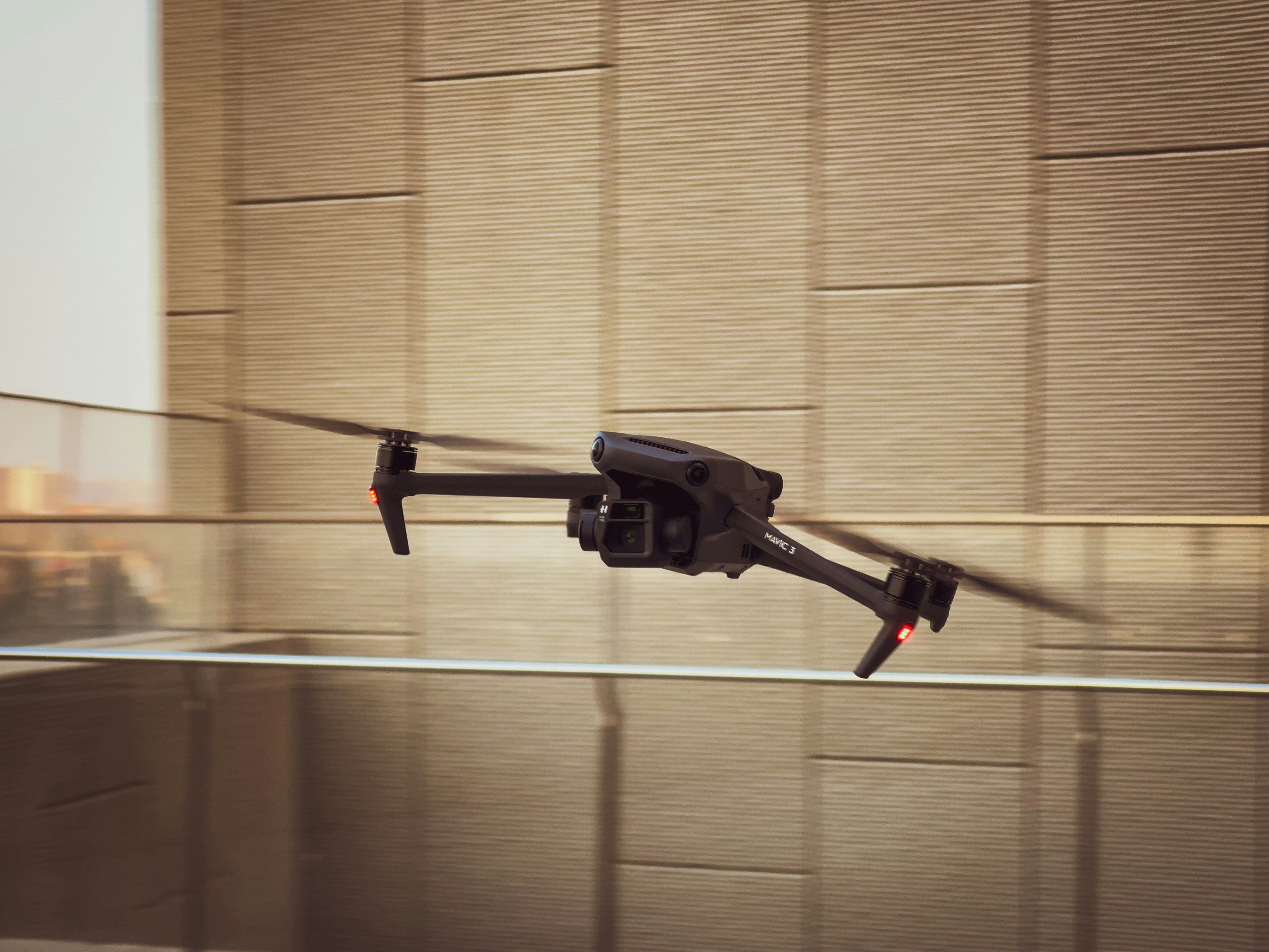 a small black object flying through the air