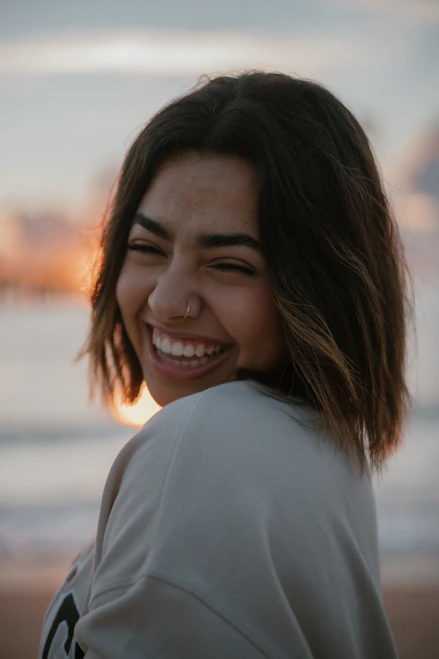 a woman with a smile on her face