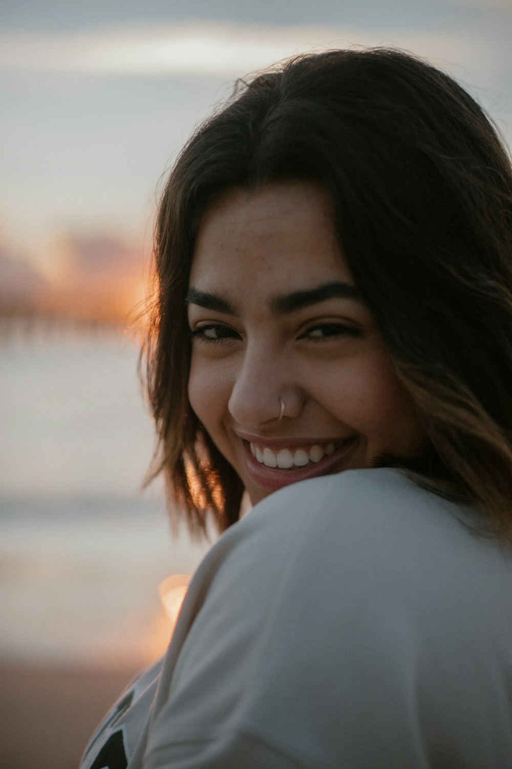 a close up of a person with a smile on their face