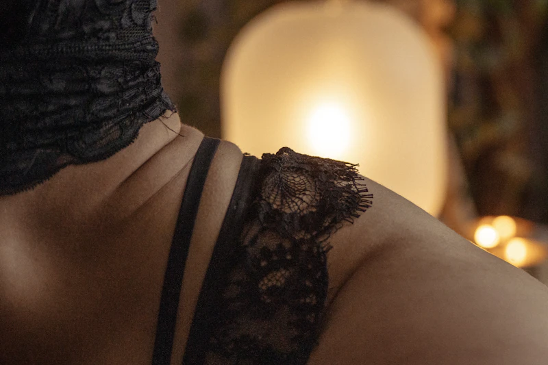 Close detail of a lace strap in warm light