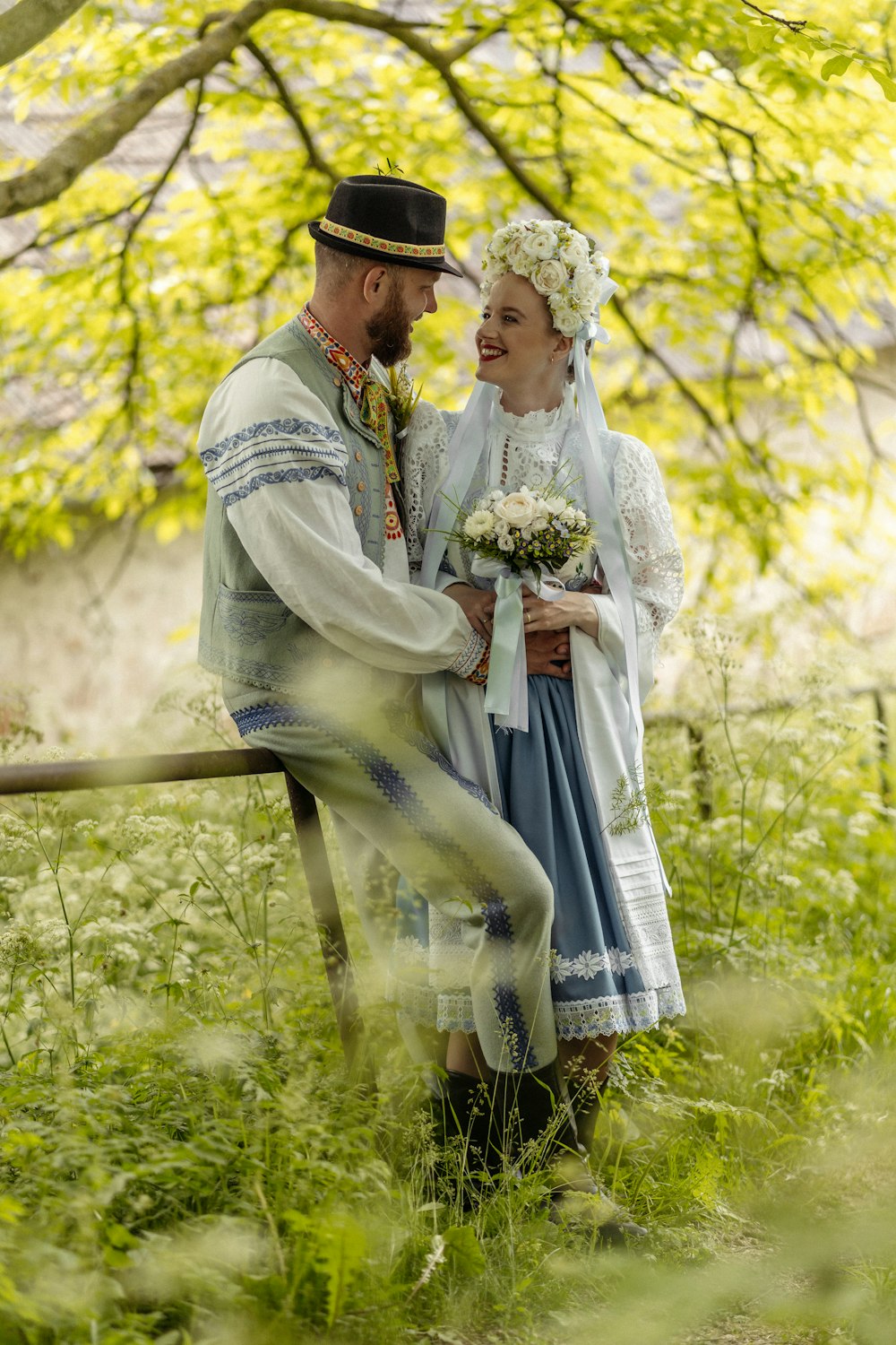 a man and a woman dressed in historical clothing