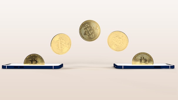 a bunch of coins flying out of a cell phone