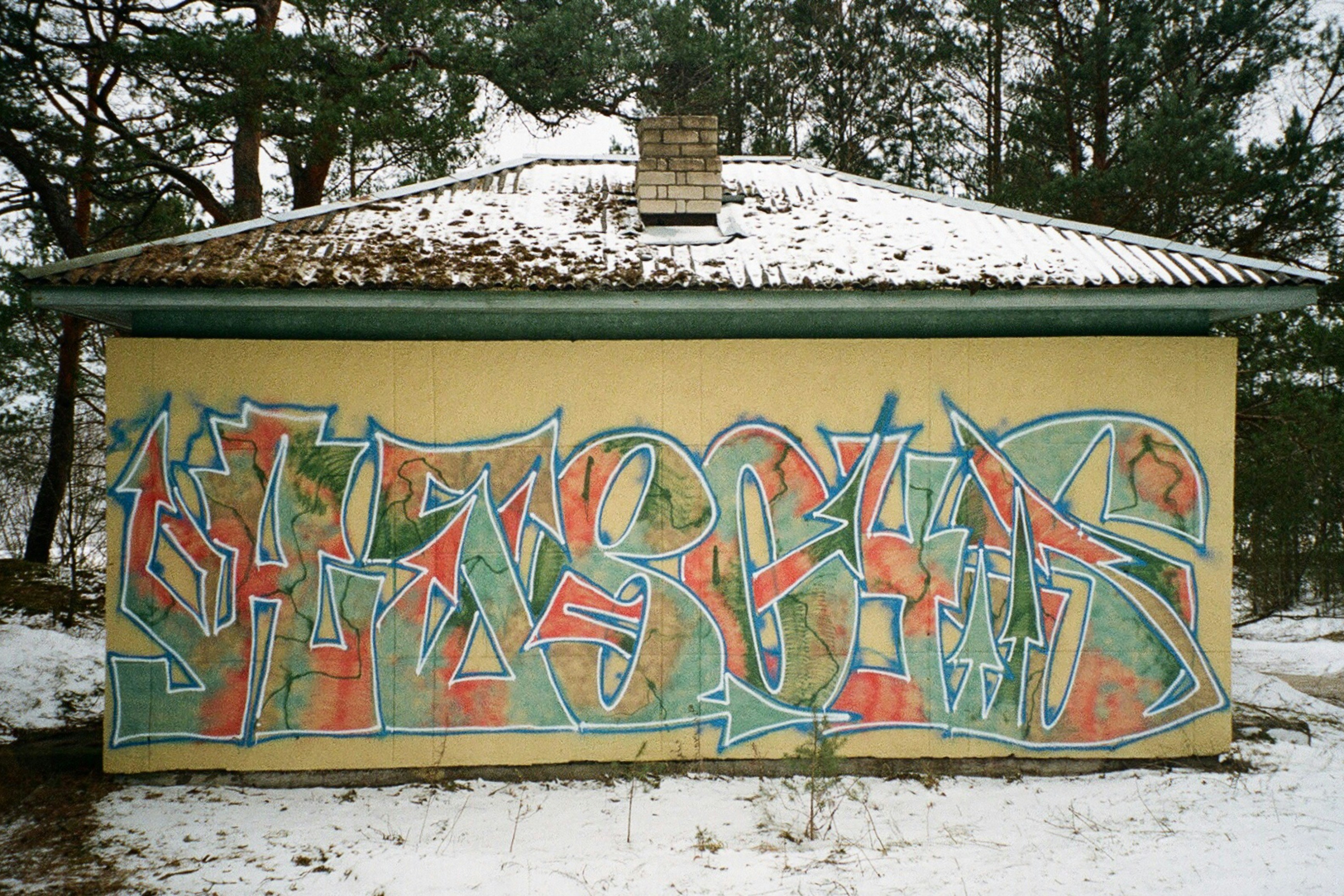 colorful graffiti on the side of a building