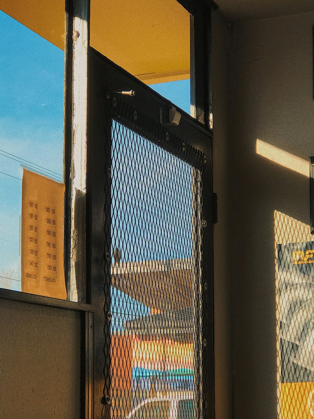 a view of a building through a gate