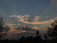 A symbolic image of a sunrise over the Congo River, representing hope and future.