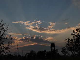 A symbolic image of a sunrise over the Congo River, representing hope and future.