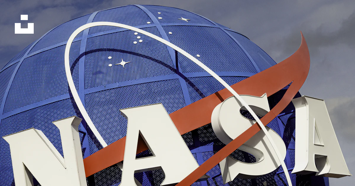 A nasa sign is shown against a blue sky photo – Free Kennedy space ...