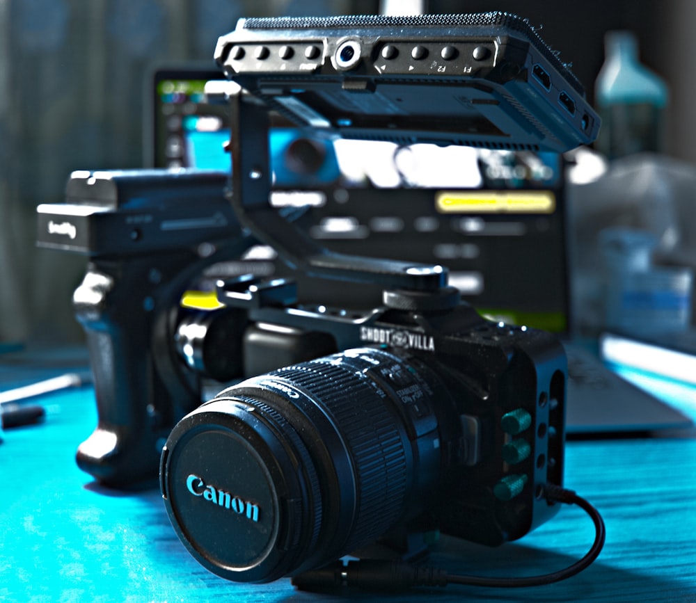 a camera sitting on top of a blue table