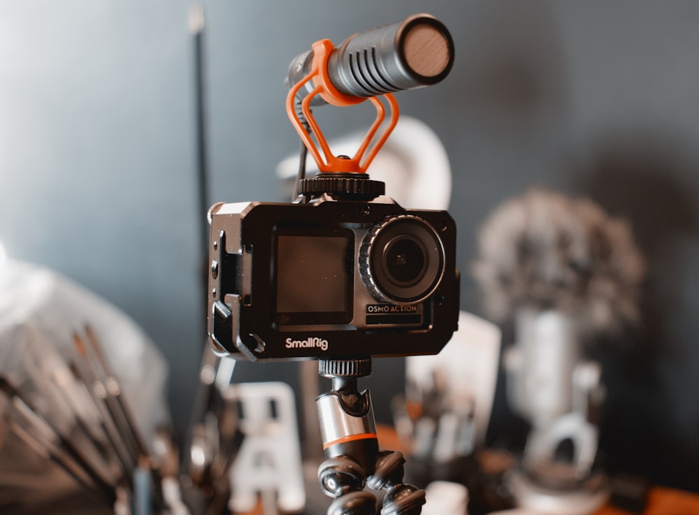 a close up of a camera on a tripod