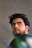 a man with a beard and a green shirt