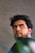 a man with a beard and a green shirt