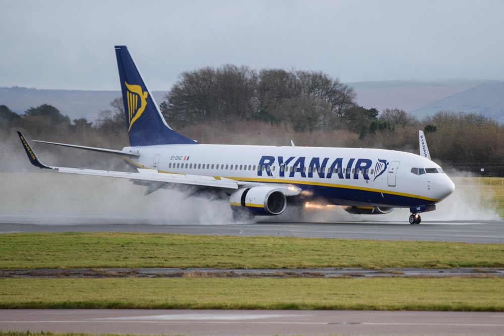 a large jetliner taking off from an airport runway