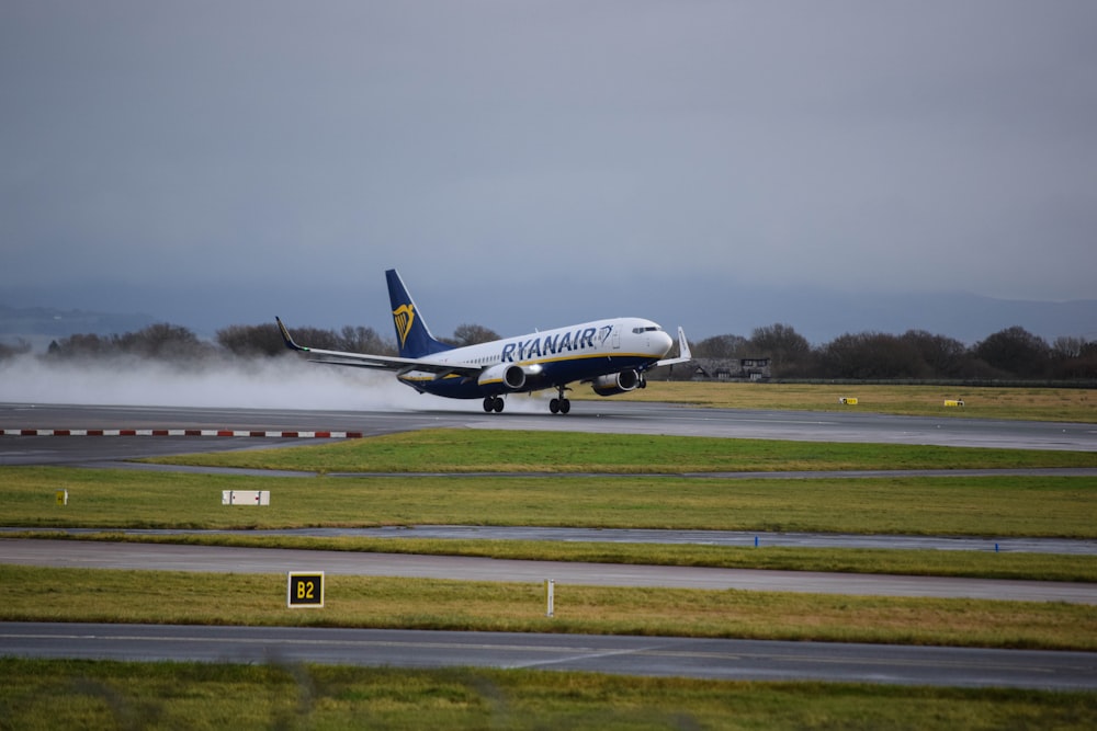 a large jetliner taking off from an airport runway