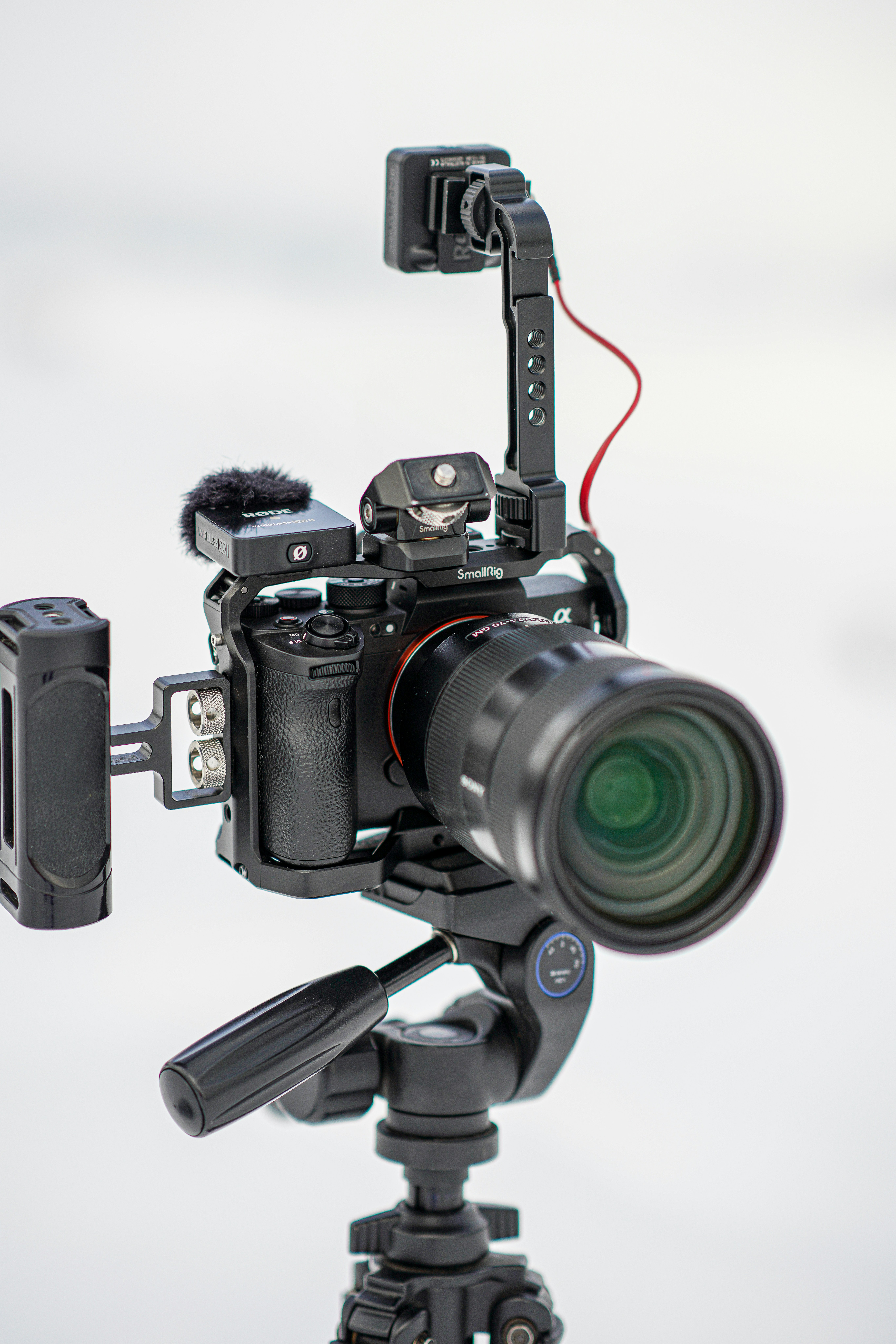 a video camera attached to a tripod