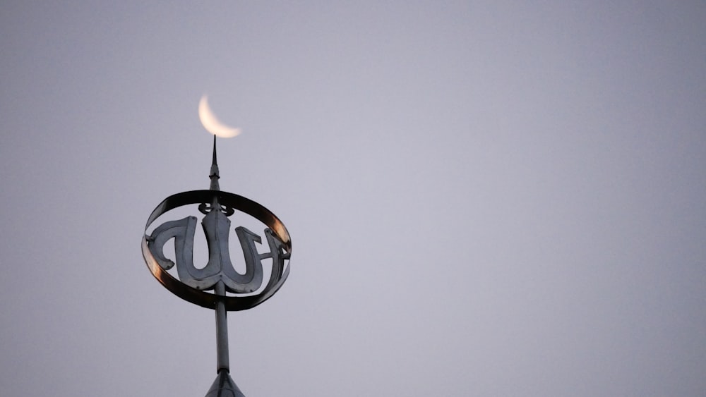 a close up of a clock on top of a building